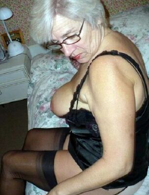 Sandy-haired grannie doing bj..