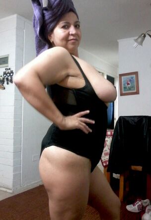Obese mature posing in fresh..